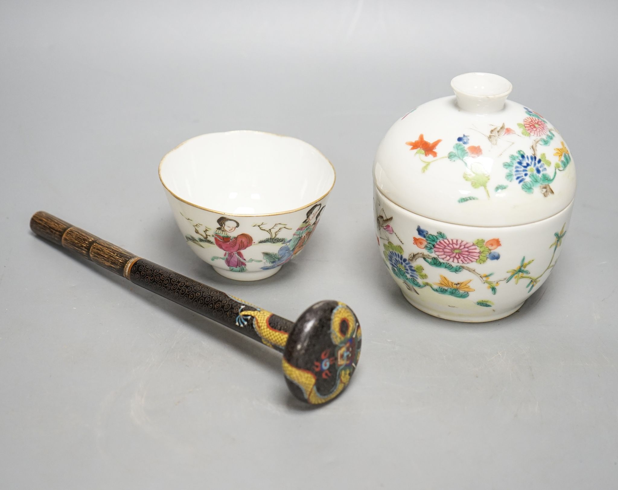 A Chinese famille rose chupu and a bowl, late 19th century, and a cloisonne parasol handle, 23cm long